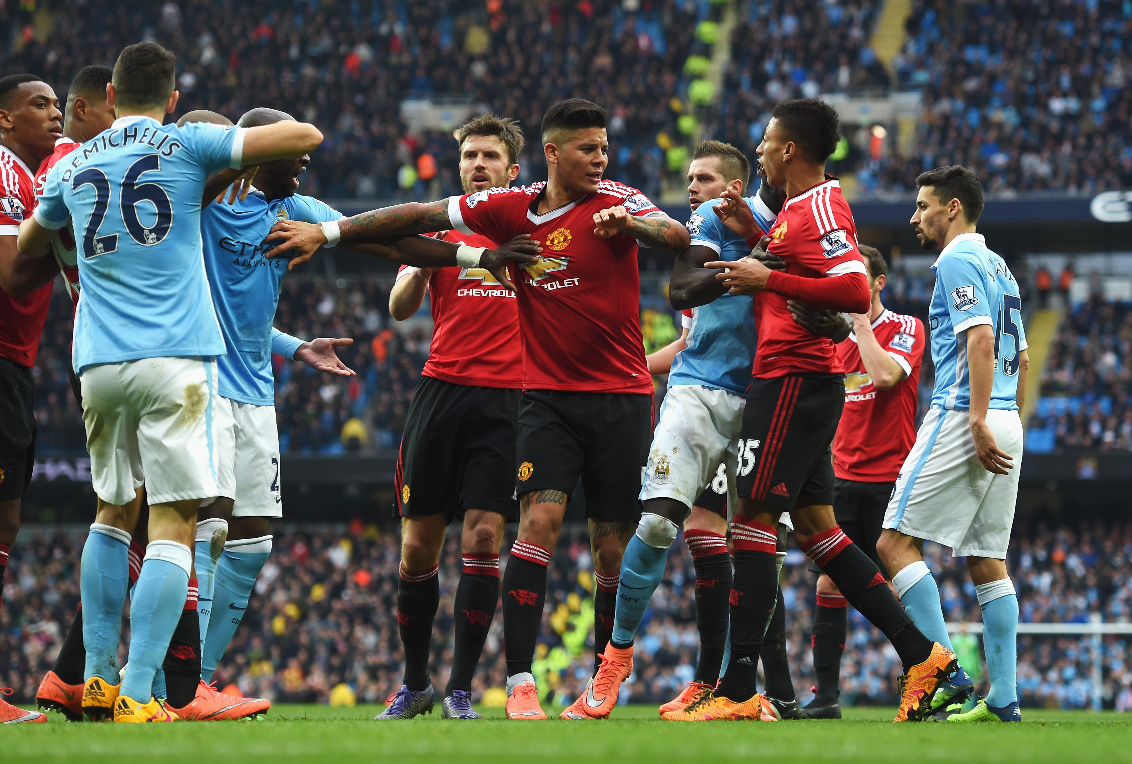 MANCHESTER, ENGLAND - MARCH 20:  Players clash during the Barclays Premier League match between Manchester City and Manchester United at Etihad Stadium on March 20, 2016 in Manchester, United Kingdom.  (Photo by Michael Regan/Getty Images)